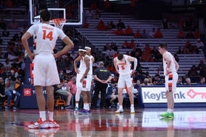 Justin Taylor (pictured No. 5), who scored a team-best 25 points, had to replace the production of the ejected Judah Mintz.